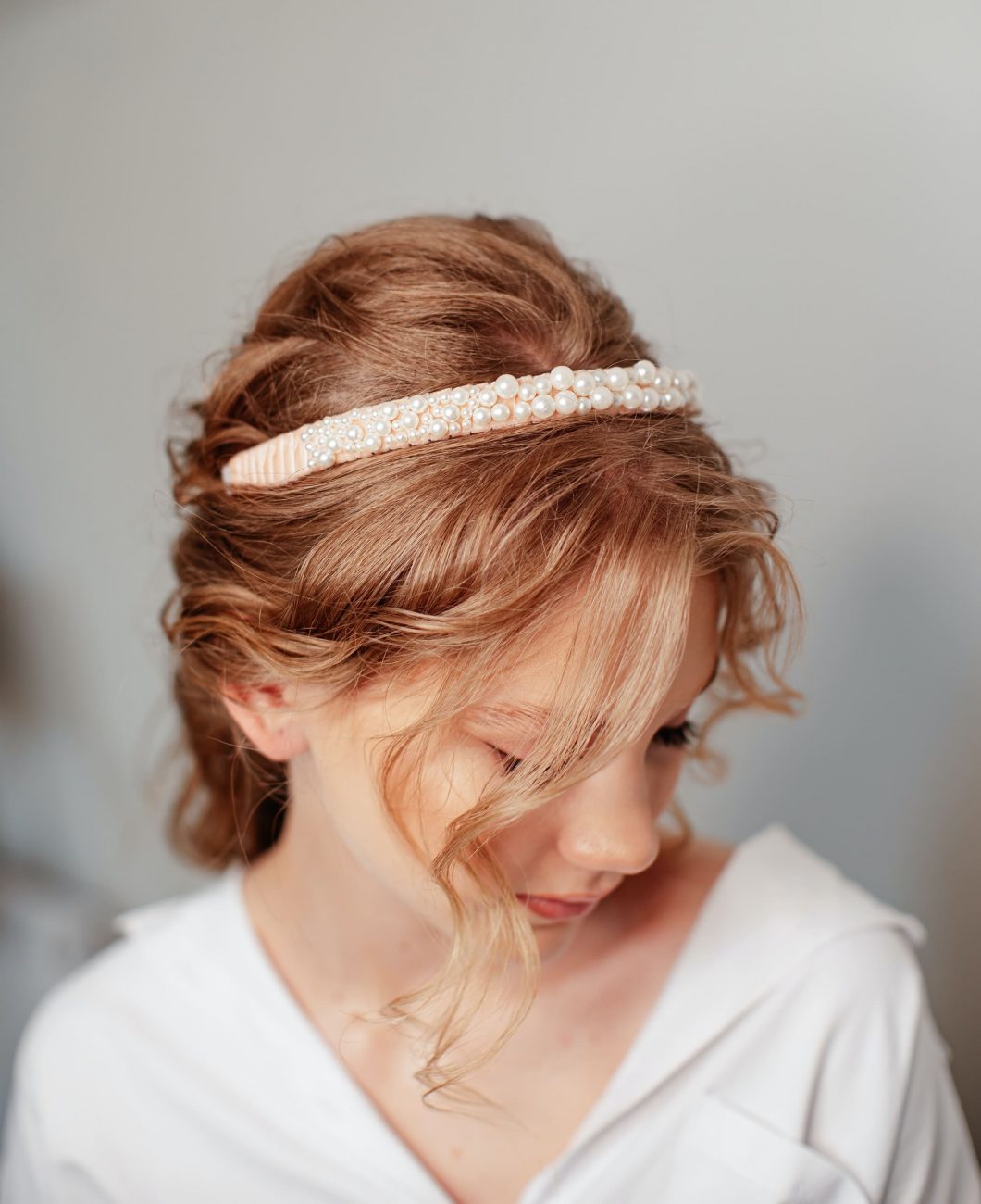 Foto do penteado de uma noiva. Imagem disponível em Pexels.